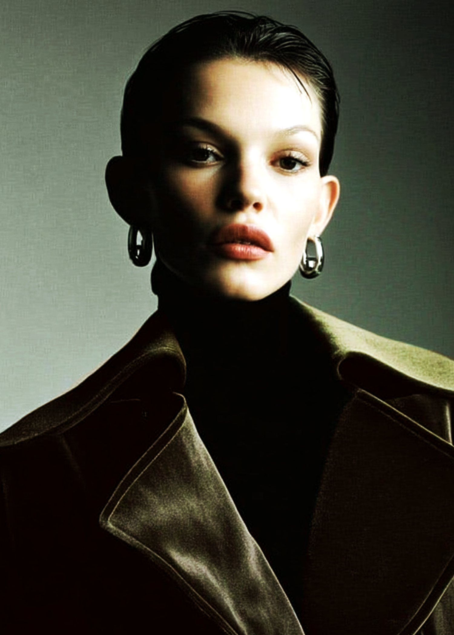 Long coat in dark green velvet