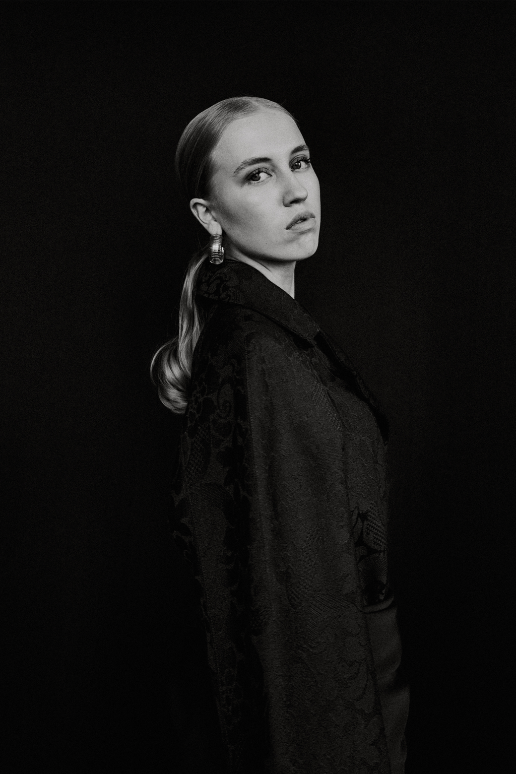 Oversized A-line black damask wool coat