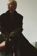 Long coat in dark green velvet