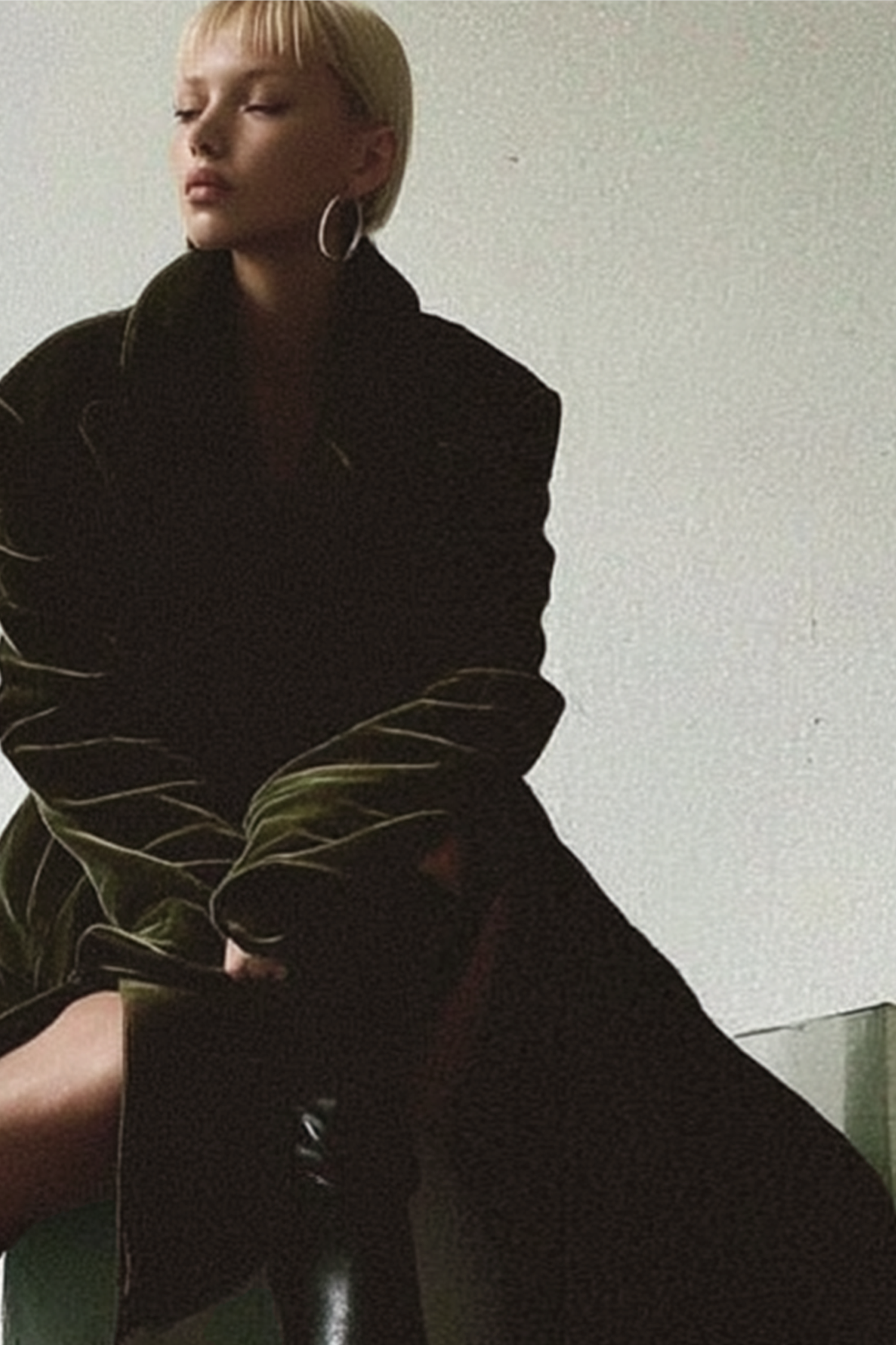 Long coat in dark green velvet